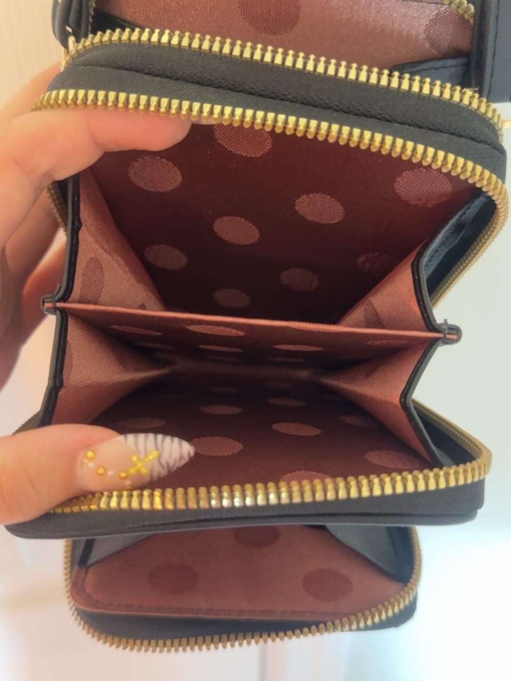 Women's Black Zip-Around Wallet with Polka Dot Interior